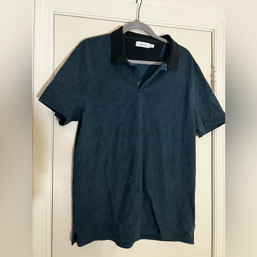 Calvin Klein Blue Polo
Size Large